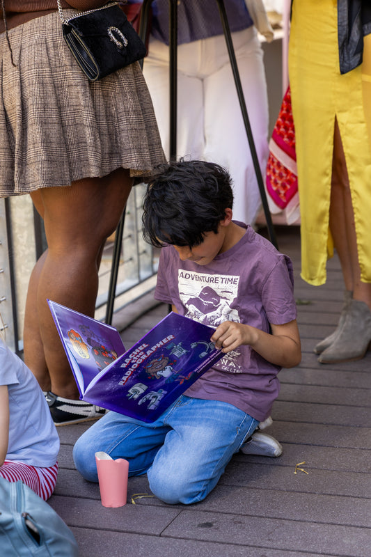 kid reading stem radiology book