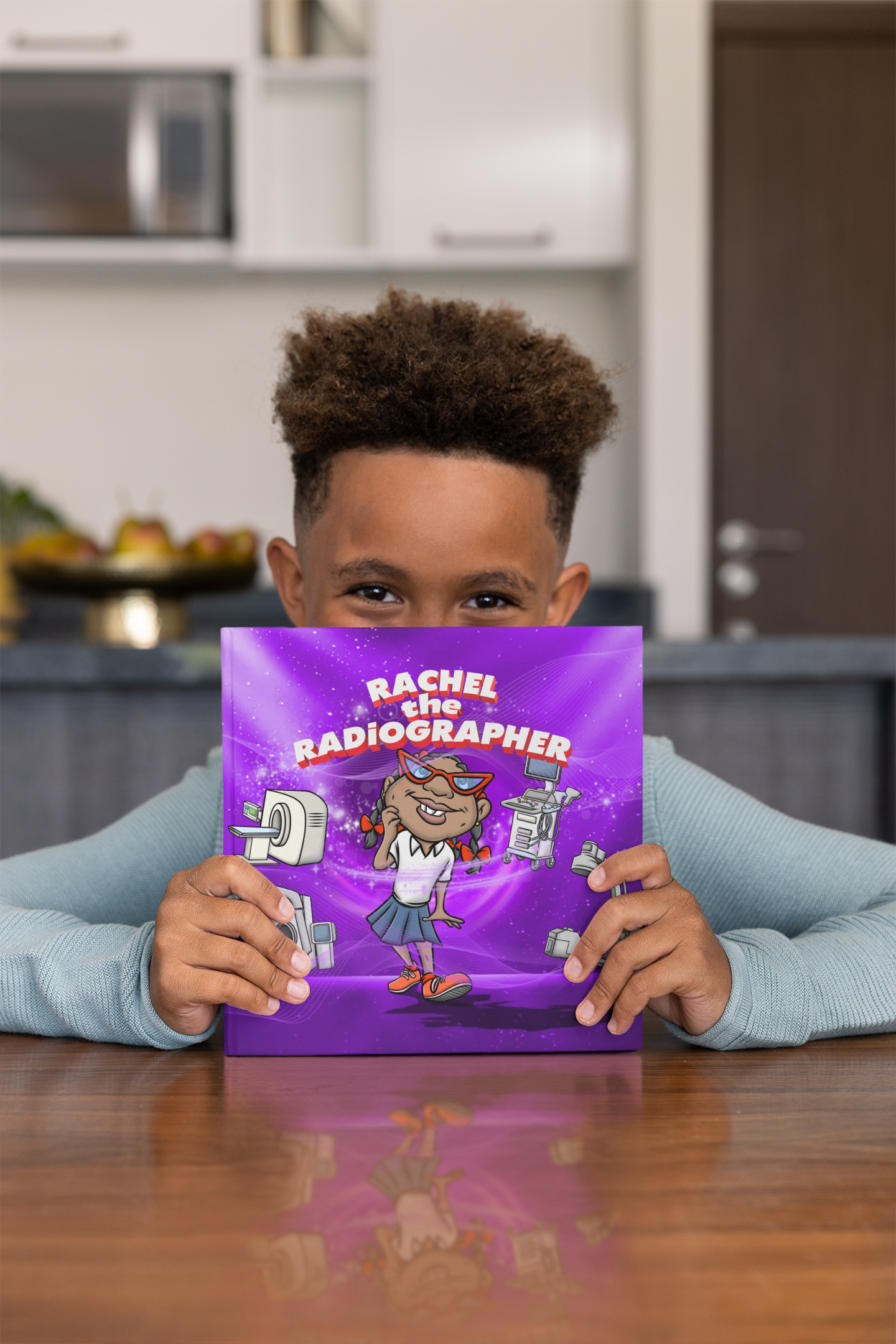 kid holding rachel the radiographer book